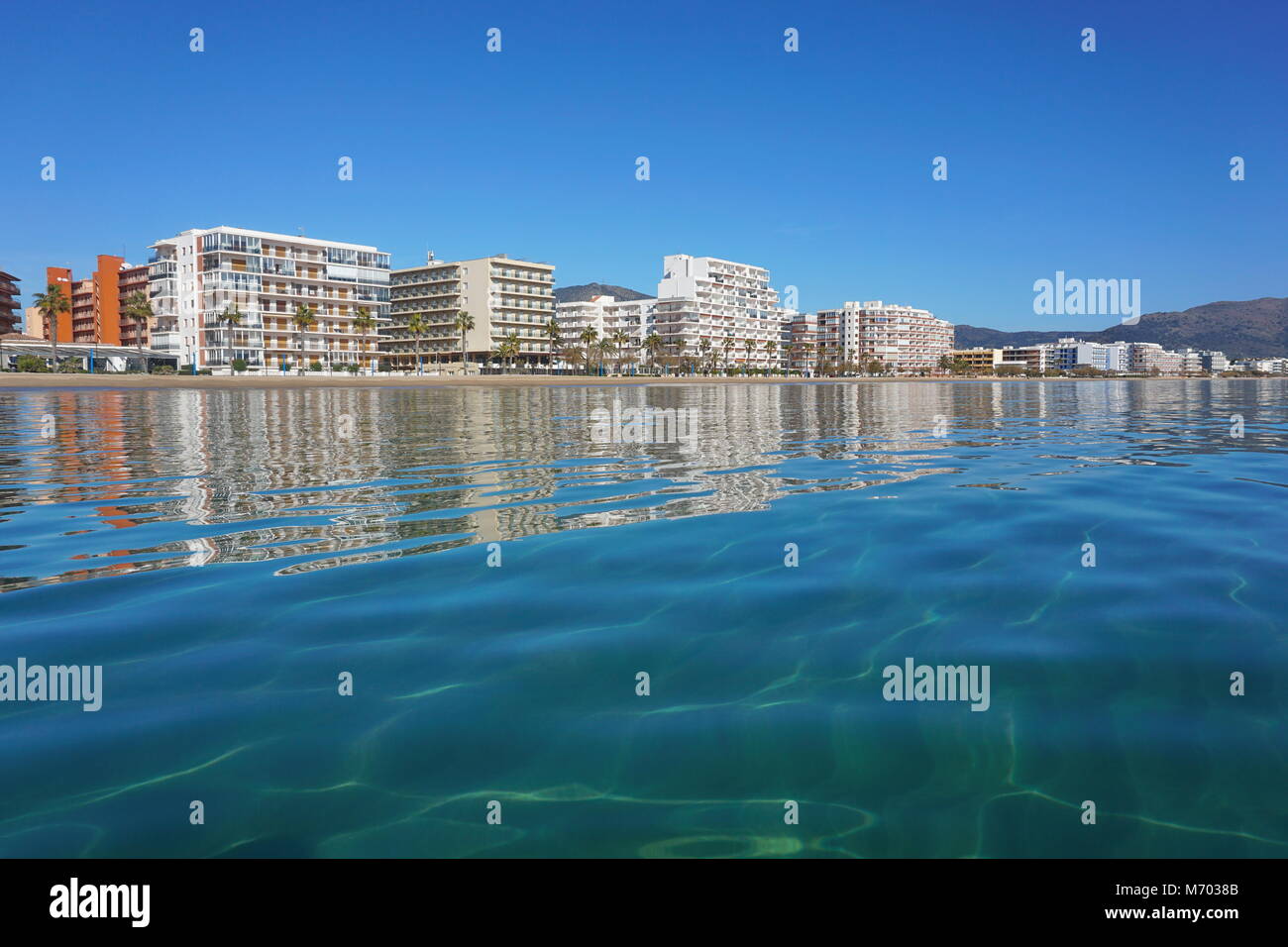 Spain Costa Brava seaside town, apartment buildings on the beachfront, Mediterranean sea, Santa Margarida, Roses, Catalonia, Girona Stock Photo