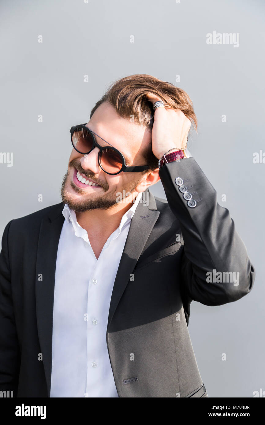 Elegant Stylish Businessman Posing Formal Wear Isolated Grey Stock Photo by  ©Y-Boychenko 214796358