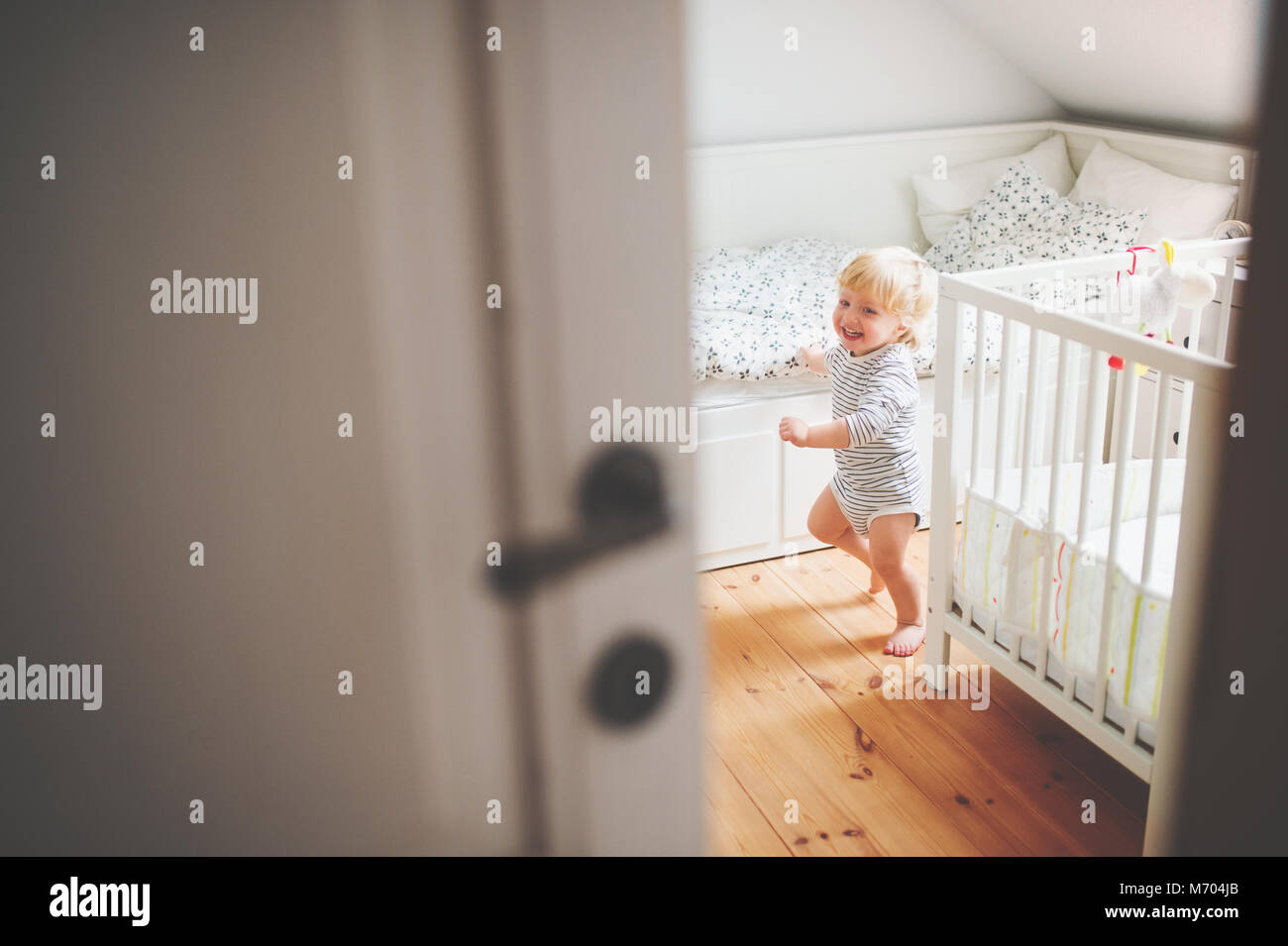 Cute Toddler Boy Running In A Bedroom Stock Photo 176409923