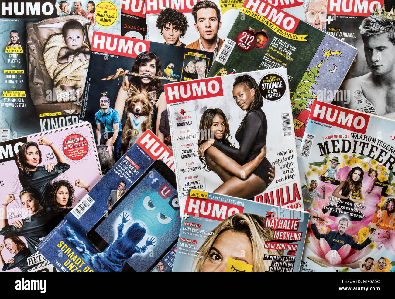 Collection of HUMO covers, popular Dutch-language Belgian weekly radio and television supermarket tabloid Stock Photo