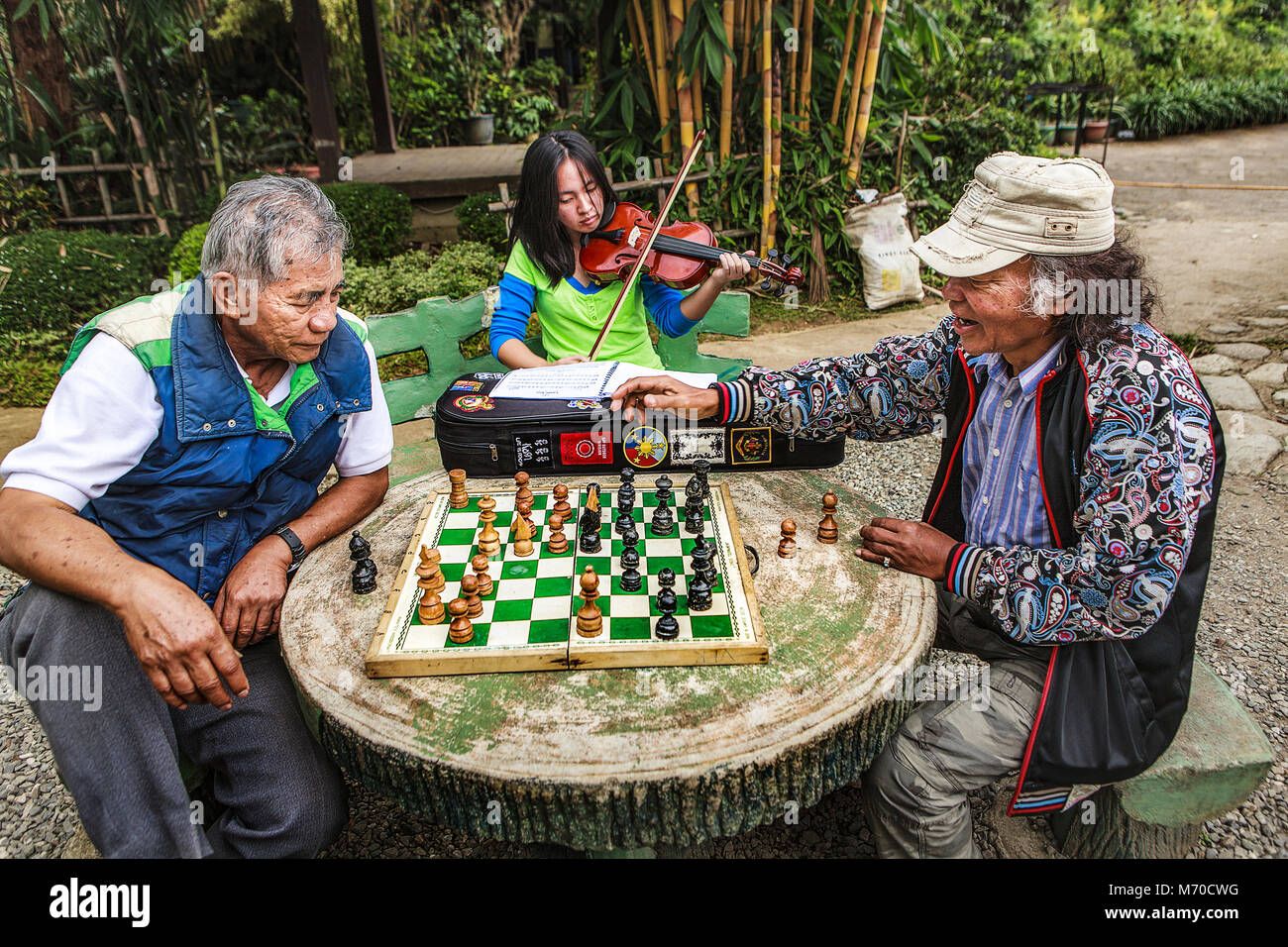 Filipino Elderly Men Play Chess Next Editorial Stock Photo - Stock Image