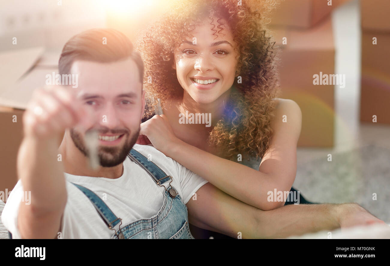 Young couple with a key to a new apartment Stock Photo - Alamy