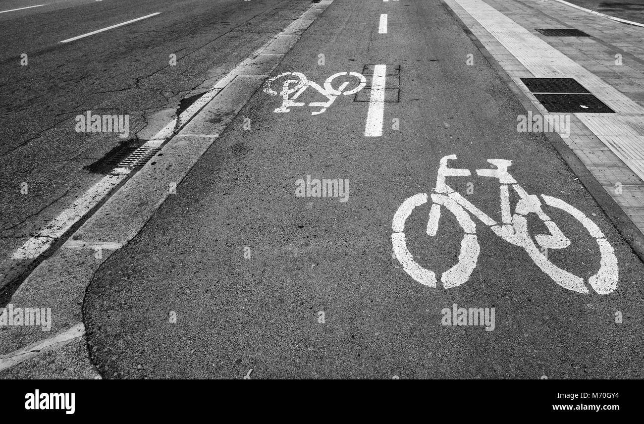 Bicycle lane sign on the road, symbol for roadway part reserved for cyclist only Stock Photo