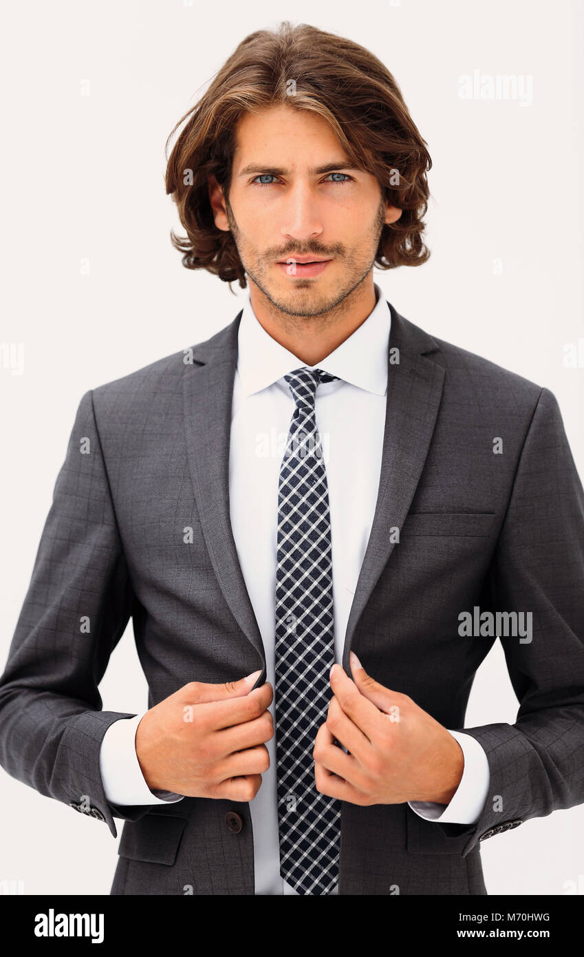 Stylish young man in suit and tie Stock Photo - Alamy