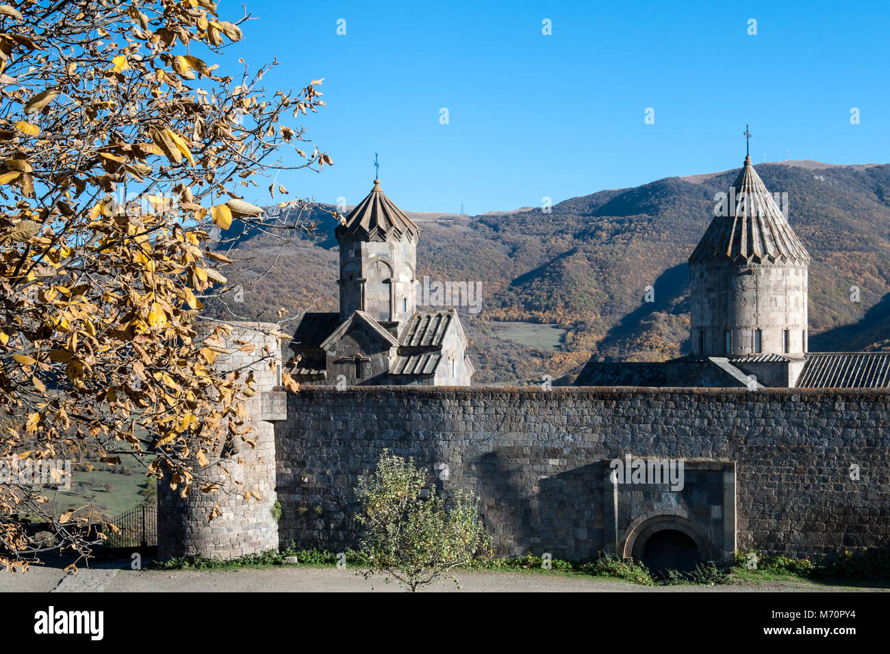 The Tatev Monastery is a 9th-century monastery located on a large basalt plateau near the Tatev village in Syunik Province in southeastern Armenia. Stock Photo