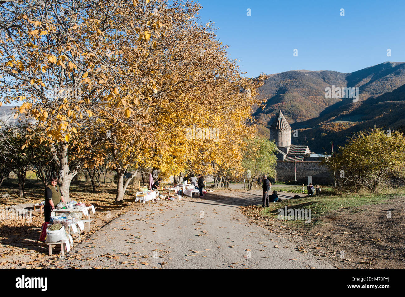 Local women are selling items to tourist at the entrance of Tatev monastery,Armenia. Stock Photo