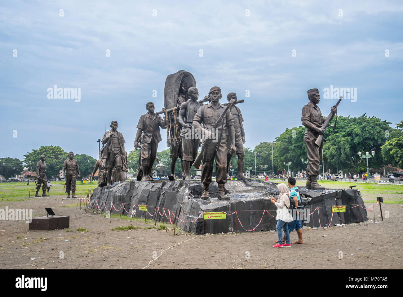 monumental sculptures on Alun Alun Lor in front of the Kraton Yogyakarta, commemorating the fight against  dutch colonial power, Stock Photo