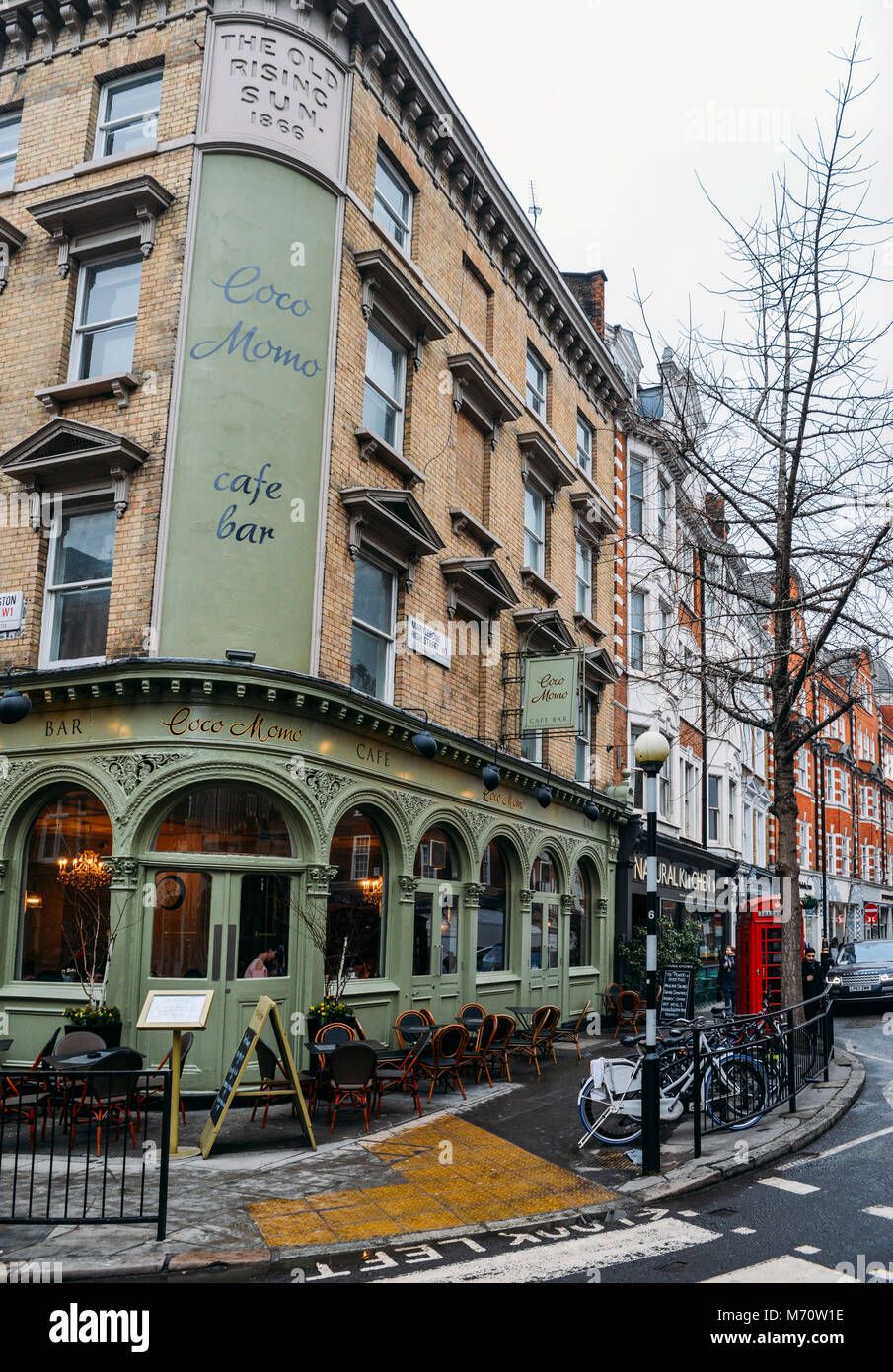 Coco Momo cafe bar on a street corner in Marylebone High Street, W1, London, UK Stock Photo