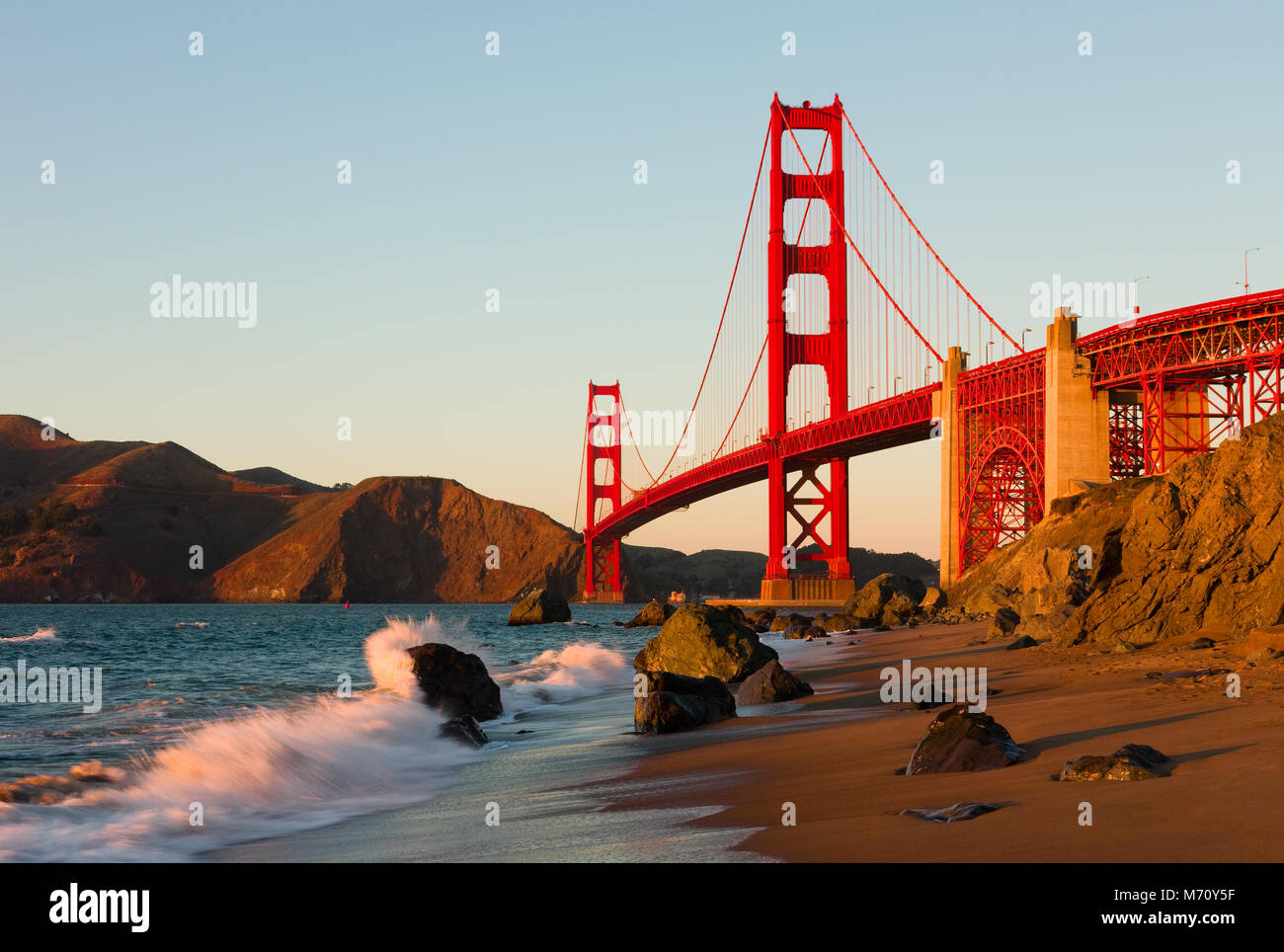 Golden Gate Bridge in San Francisco at sunset Stock Photo