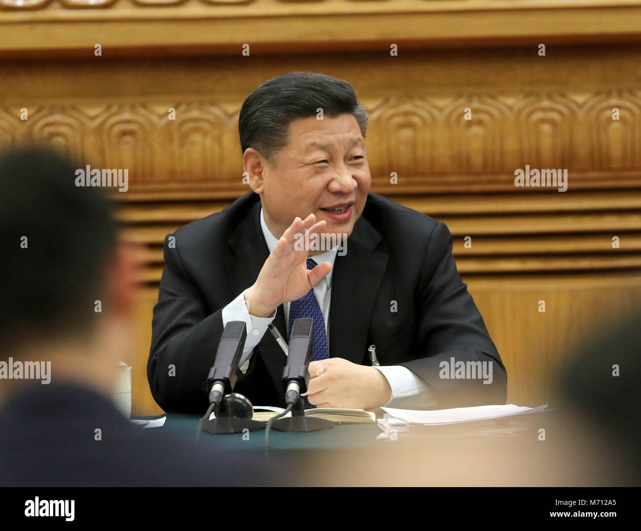 Beijing, China. 7th Mar, 2018. Chinese President Xi Jinping, also general secretary of the Communist Party of China (CPC) Central Committee and chairman of the Central Military Commission, joins a panel discussion with the deputies from Guangdong Province at the first session of the 13th National People's Congress in Beijing, capital of China, March 7, 2018. Credit: Liu Weibing/Xinhua/Alamy Live News Stock Photo