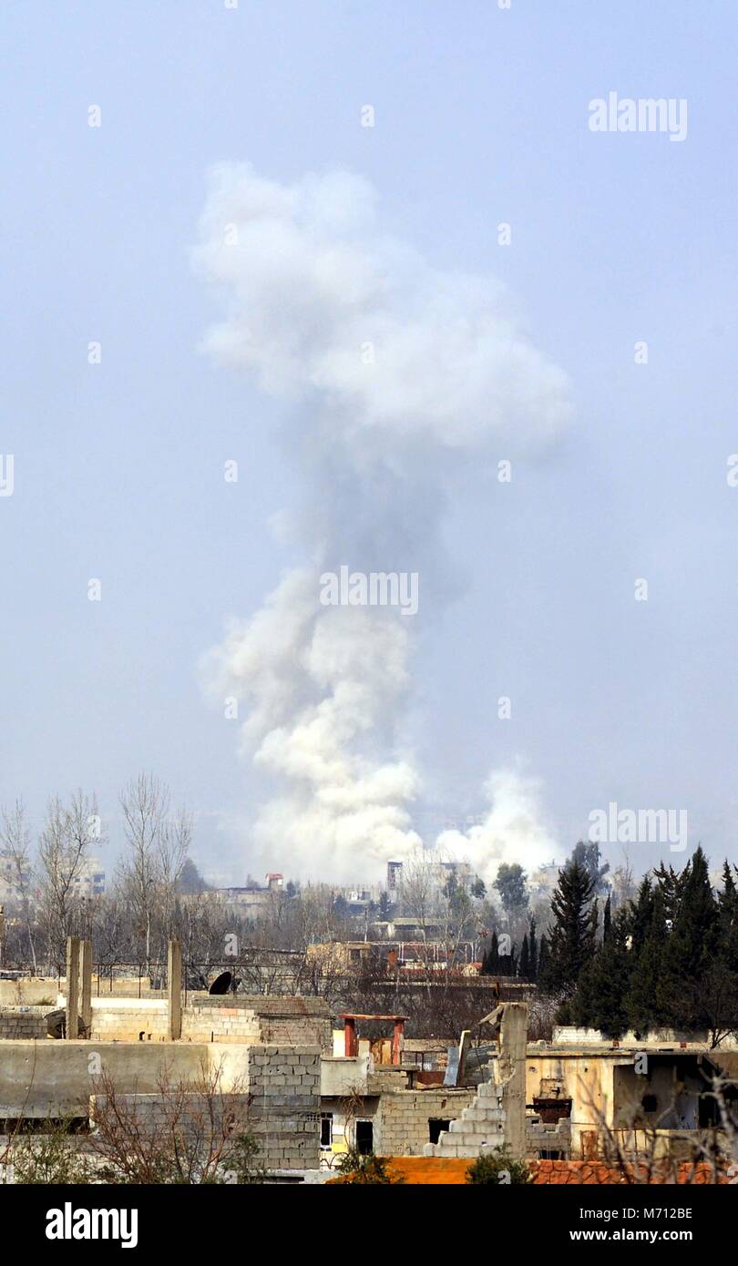 Damascus. 7th Mar, 2018. Smoke resulted from airstrikes rises over the capital Damascus' rebel-held areas of Eastern Ghouta countryside on March 7, 2018. Credit: Ammar Safarjalani/Xinhua/Alamy Live News Stock Photo