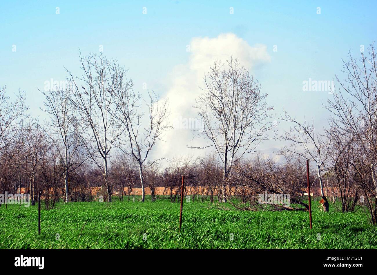 Damascus. 7th Mar, 2018. Smoke resulted from airstrikes rises over the capital Damascus' rebel-held areas of Eastern Ghouta countryside on March 7, 2018. Credit: Ammar Safarjalani/Xinhua/Alamy Live News Stock Photo