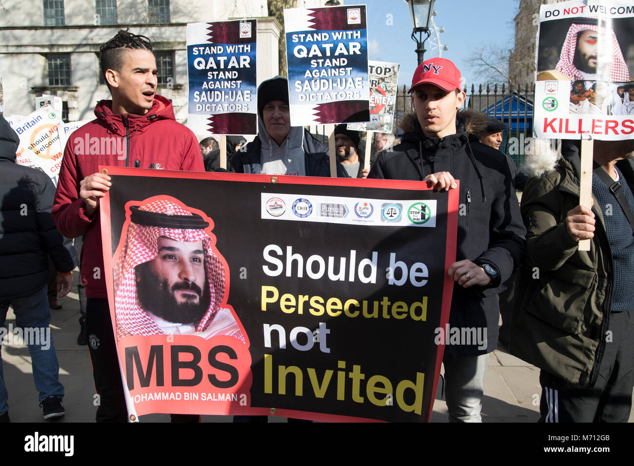 London, UK. 7th March, 2018. Protesters demonstrate on Whitehall against Saudi Crown Prince Mohammad Bin Salman official visit to the UK on 7th March 2018 in London, United Kingdom. Mohammad bin Salman started his visit to the UK with the Conservative Party and royal family rolling out the red carpet for Saudi Arabias crown prince as opposition politicians and rights groups call on the British Prime Minister to use the trip to challenge the kingdoms record on human rights. bes as the worlds worst h Credit: Michael Kemp/Alamy Live News Stock Photo