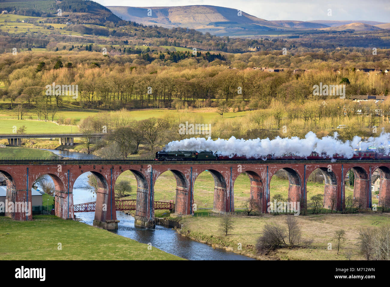Whalley. United Kingdom.  5th March 2018.  Steam locomotive no..  Restored steam locomotive no. 35018 the British India Line steams over the Whalley Arches viaduct on a test run for West Coast Railways. The Arches have recently had a £1.6m overhaul to counteract flood damage to the Victorian bridge. Credit: John Davidson Photos/Alamy Live News Stock Photo