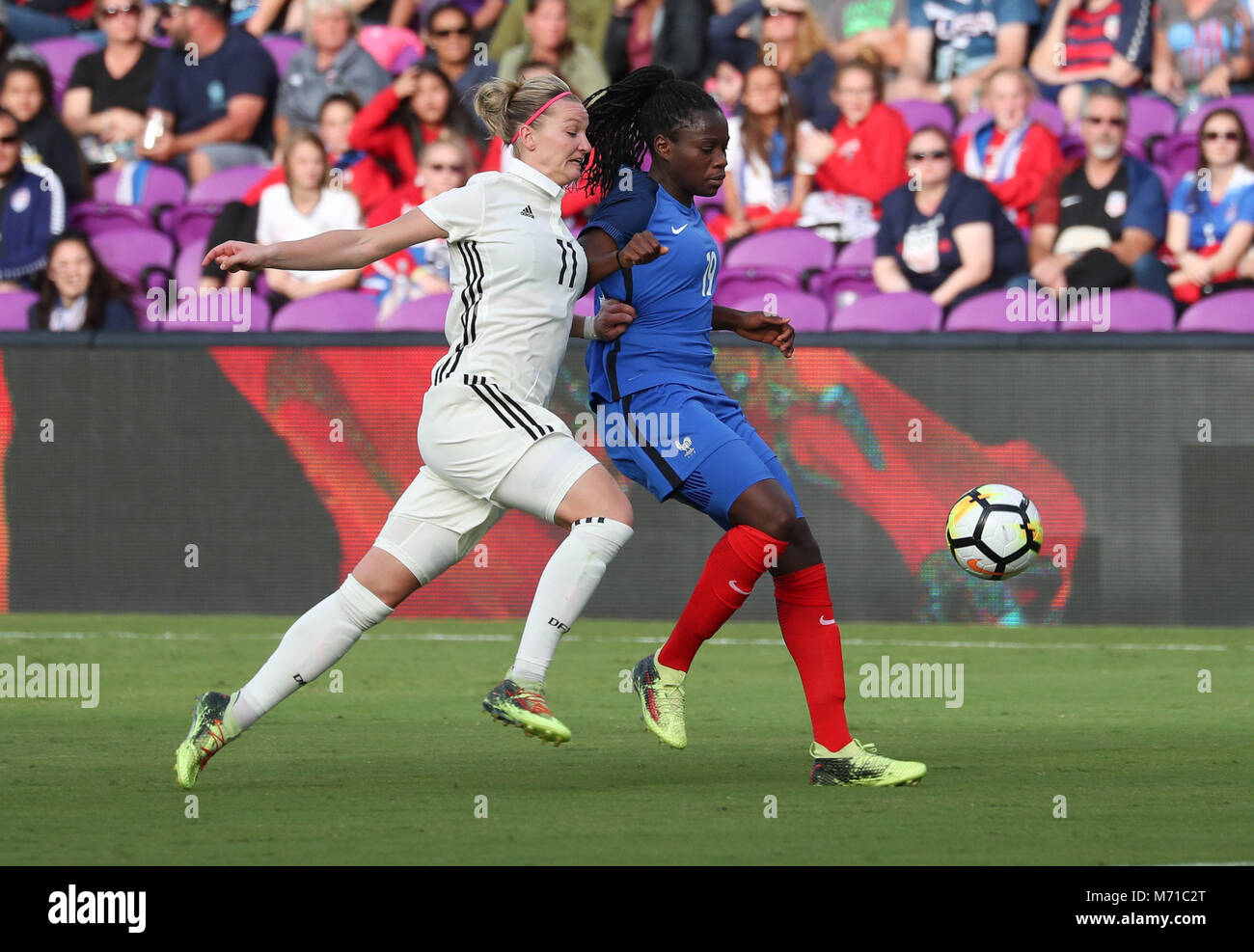 Orlando, Florida, USA. 7th Mar, 2018. Germany forward Alexandra Popp (11) battles for the ball with France defender Griedge Mbock Bathy (19) during the first half of the SheBelieves Cup women's soccer match between the German Women's National Team and the French Women's National Team at the Orlando City Stadium in Orlando, Florida. Credit: Mario Houben/ZUMA Wire/Alamy Live News Stock Photo