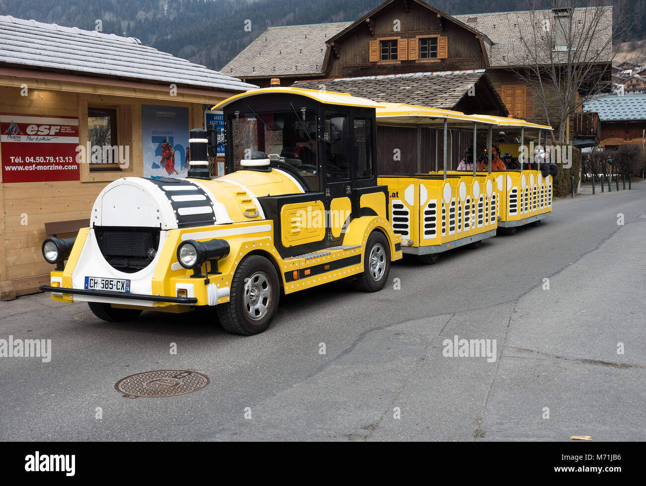Complimentary Passenger Train Service for Transporting Skiers, Snowboarders and Hikers Around the Ski Resort of Morzine Haute Savoie France Stock Photo