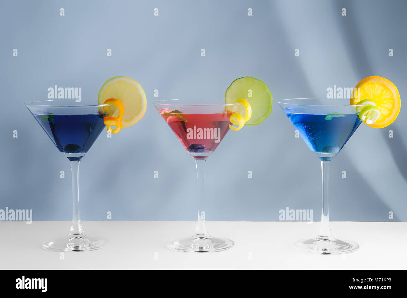 Three Colourful Cocktail Drinks Stock Photo