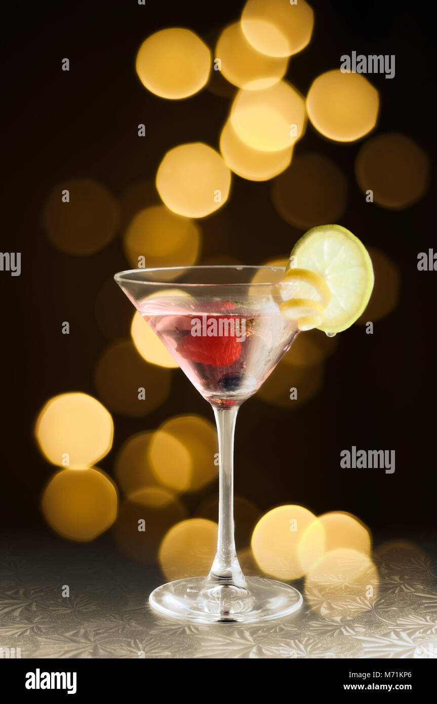 Festive cocktail with bright lights Stock Photo