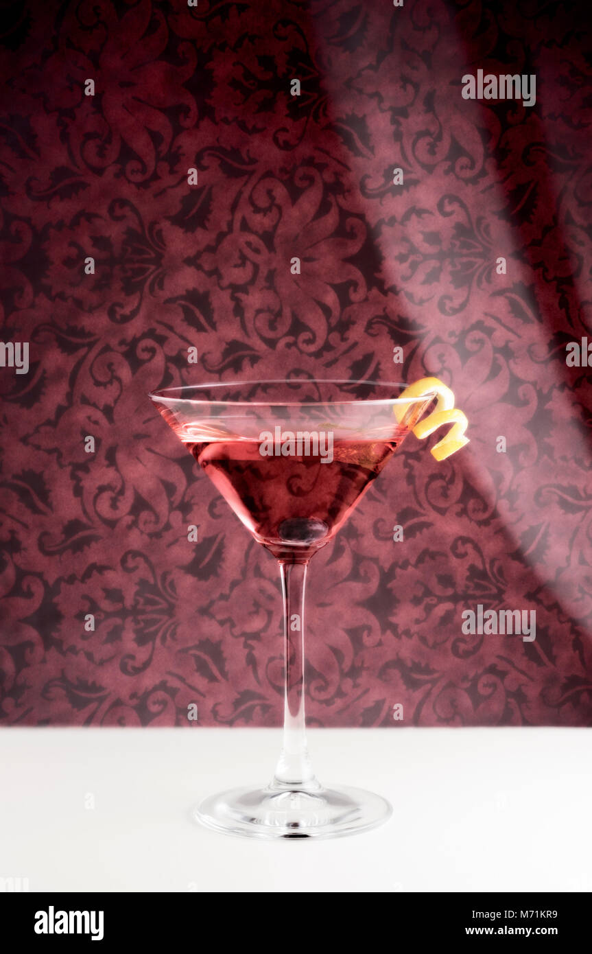 Pink cocktail with retro tapestry Stock Photo