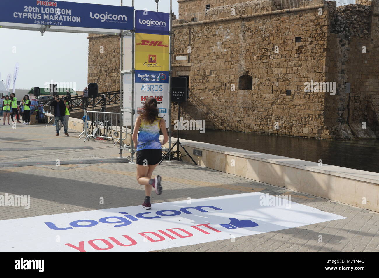 Competitors completing the 20th Logicom Cyprus marathon, half marathon, 10KM, 5KM fun run for international competitors in kato Paphos, Cyprus, Europe Stock Photo