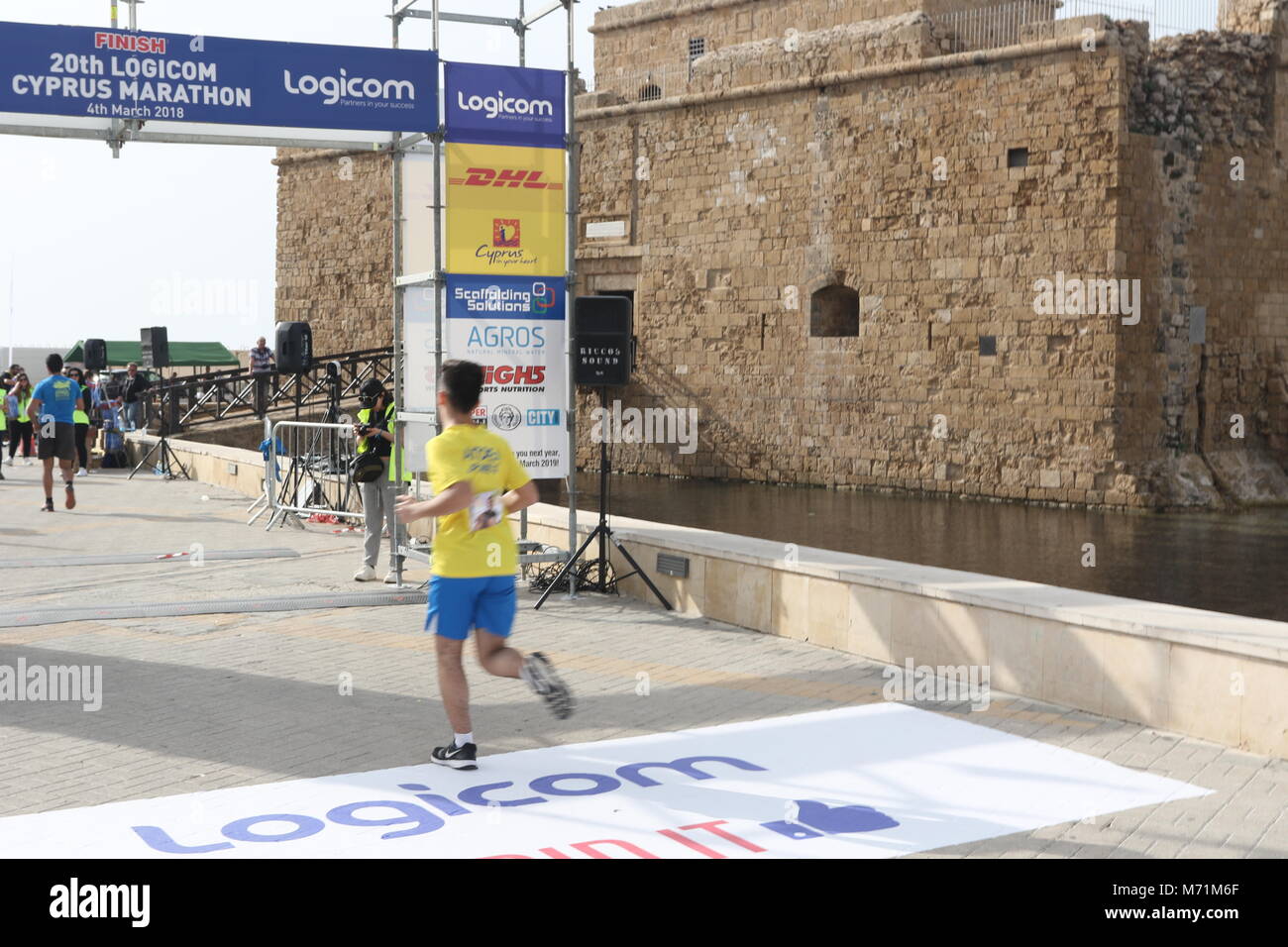 Competitors completing the 20th Logicom Cyprus marathon, half marathon, 10KM, 5KM fun run for international competitors in kato Paphos, Cyprus, Europe Stock Photo