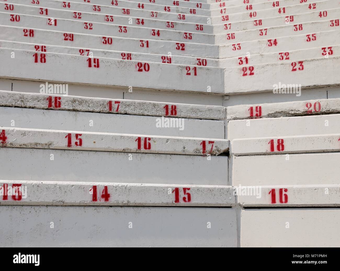 many numbers on the stadium bleachers to indicate a seat Stock Photo
