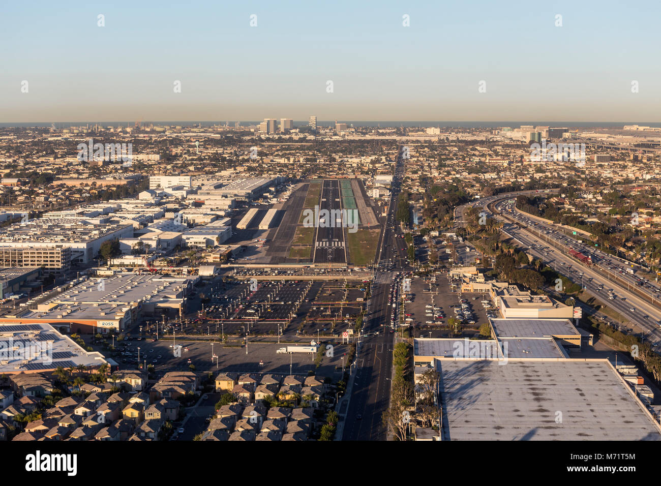 Hawthorne, California, USA - February 20, 2018:  Aircraft point of view aerial on approach to small airport runway near Los Angeles. Stock Photo