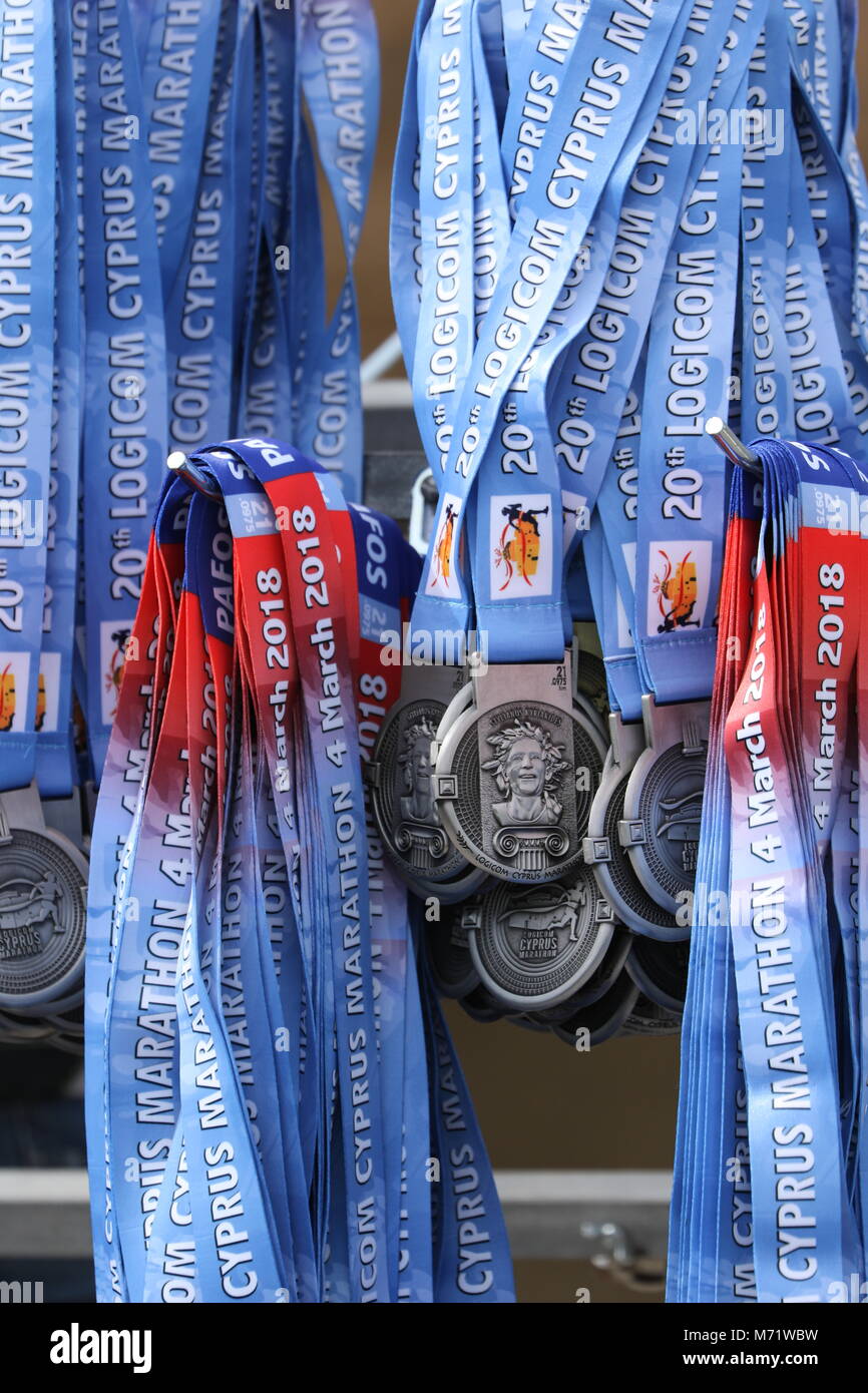 Medals awaiting awarding at the 20th Logicom Cyprus marathon, half marathon, 10KM, 5KM fun run for international competitors in Paphos, Cyprus, Europe Stock Photo