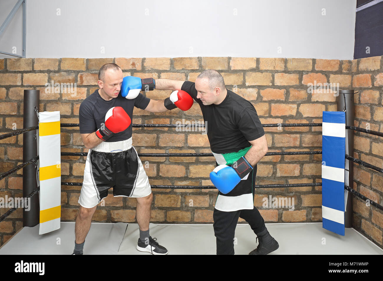 Boxers Sparring Practice Training in Boxing Ring Stock Photo - Alamy