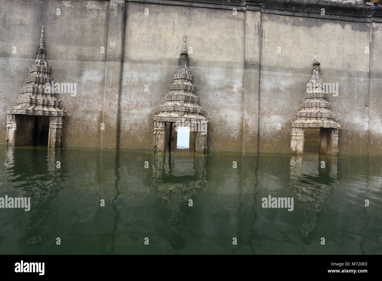 The Sunken Temple, Wat Saam Prasob, is the only remaining structure in this village purposely flooded after construction of the Khao Lem Dam. Stock Photo