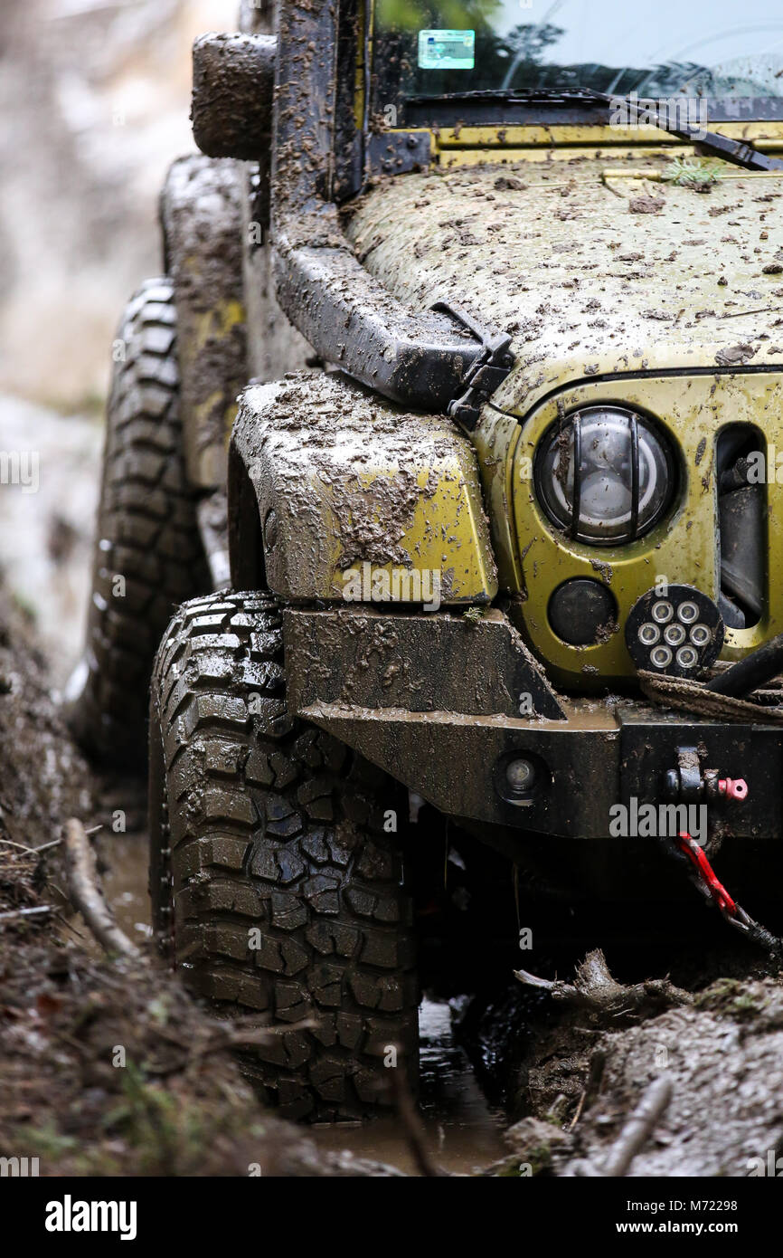 Jeep in mud Stock Photo