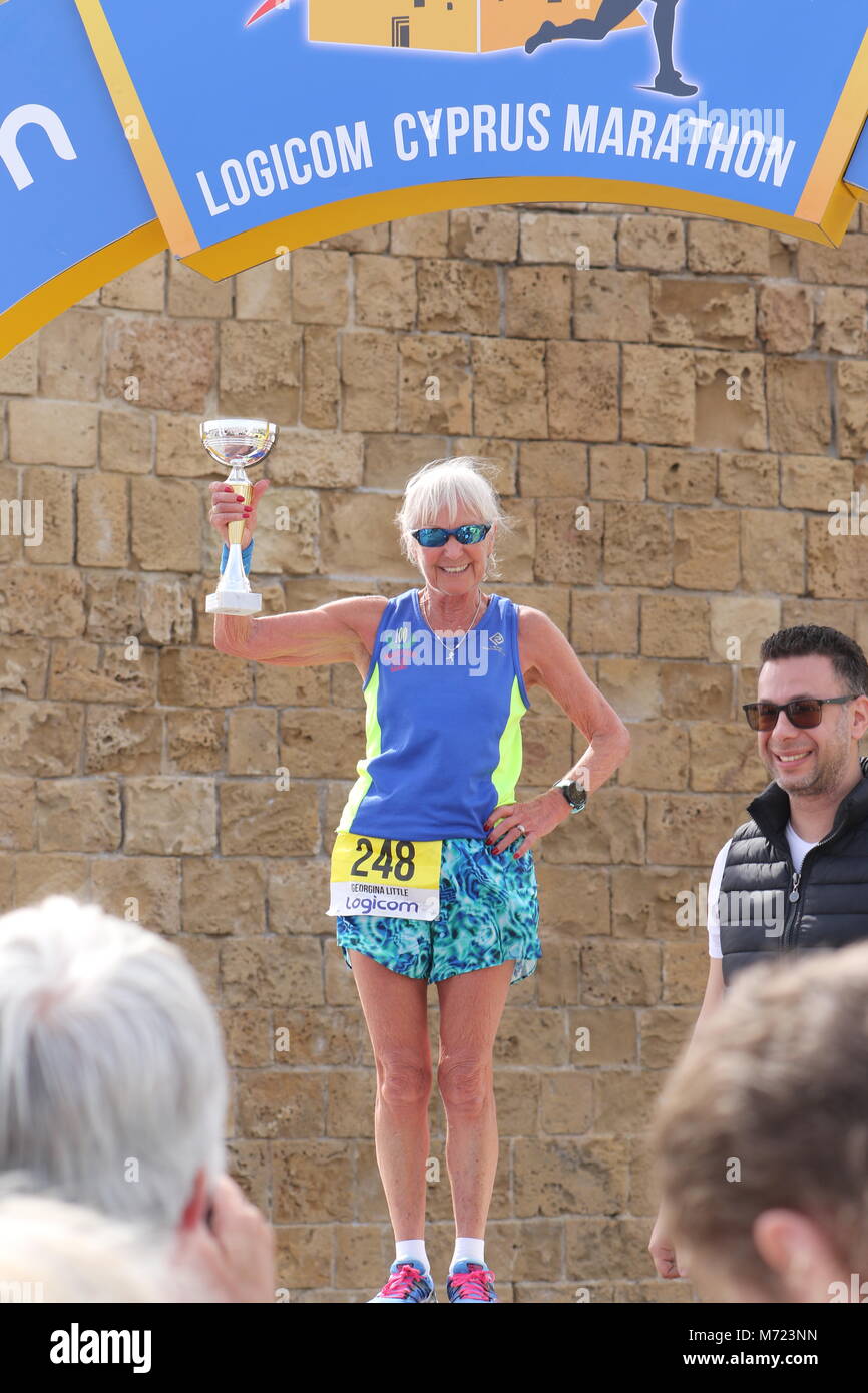 Prize winners with their trophies at 20th Logicom Cyprus marathon, half marathon, 10KM, 5KM fun run, Paphos harbour near Paphos fort, Cyprus, Europe Stock Photo