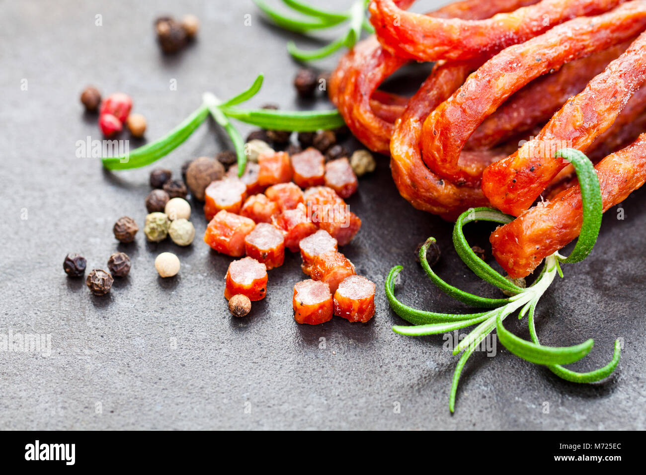 Tasty pork sausages with spices and rosemary leaves Stock Photo Alamy