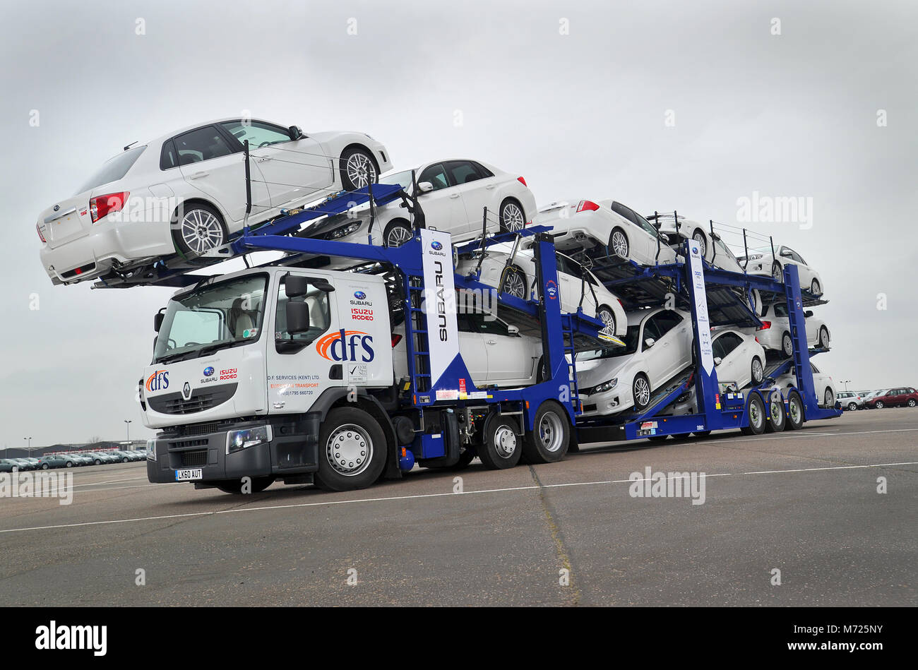 car transporter lorry loaded with new cars Stock Photo