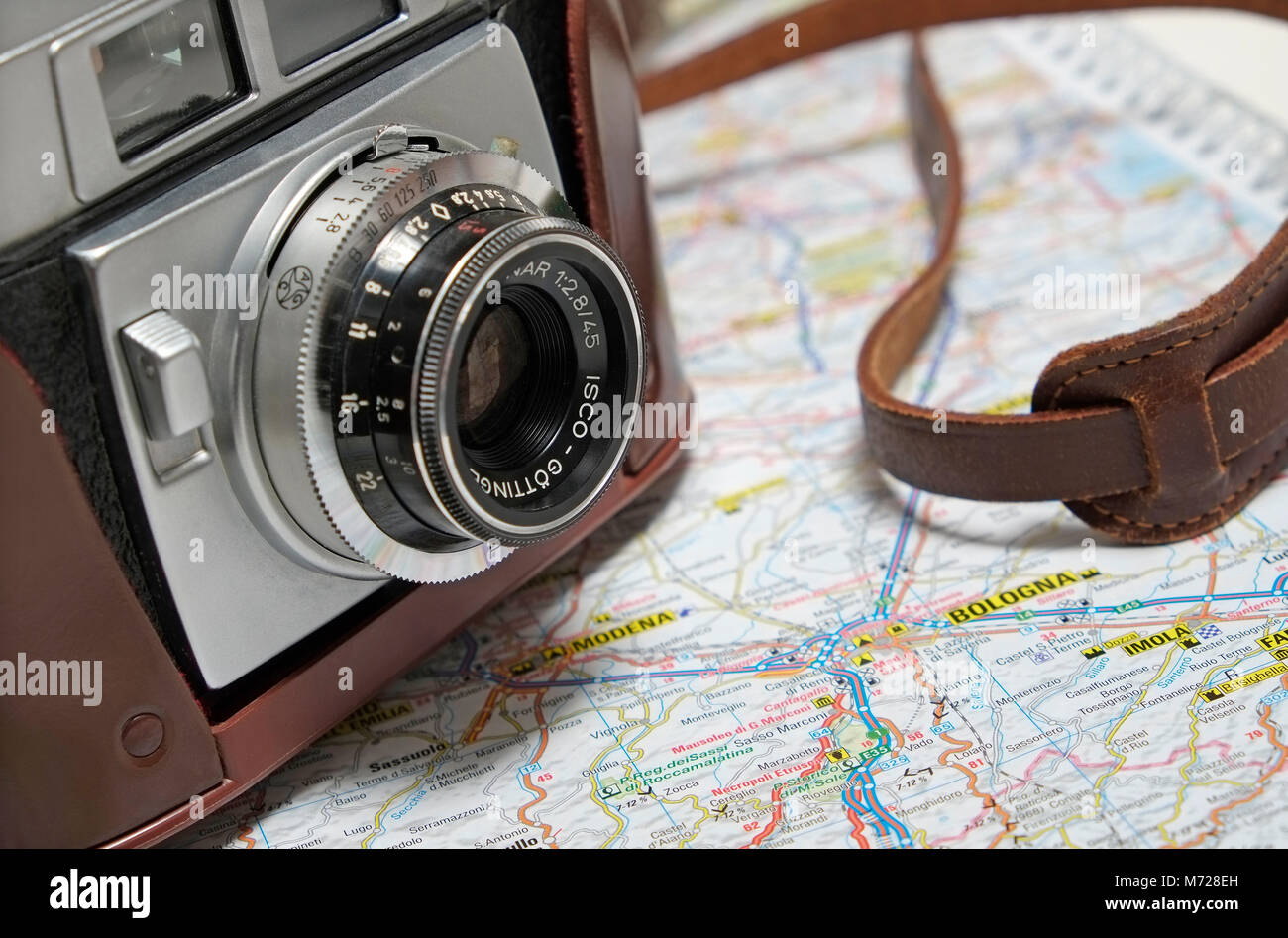 old retro style 35mm rangefinder camera on map of italy Stock Photo