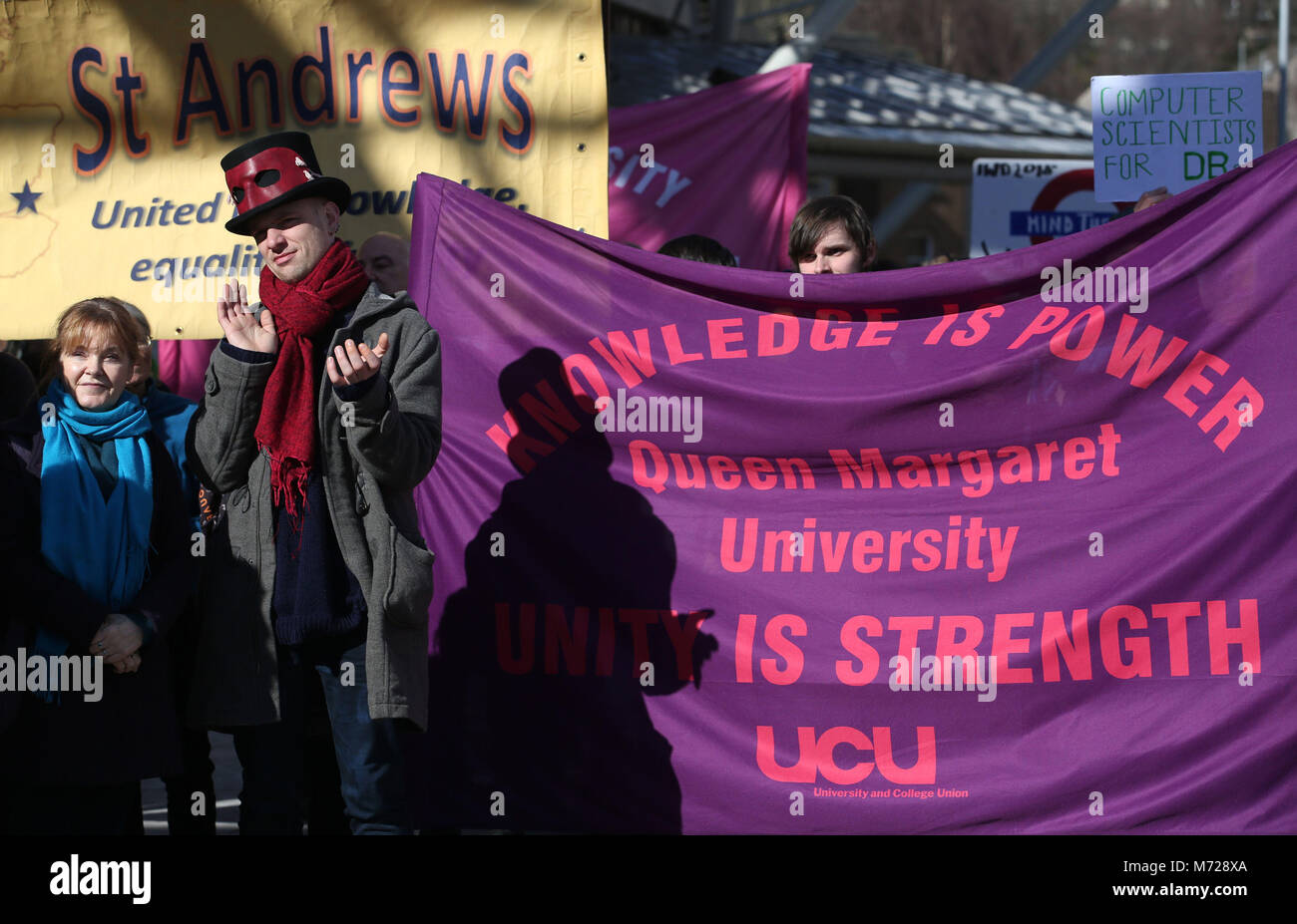University staff are joined by politicians and students as they hold University pensions row rally outside the Scottish Parliament in Edinburgh as part of their ongoing strike action. Stock Photo