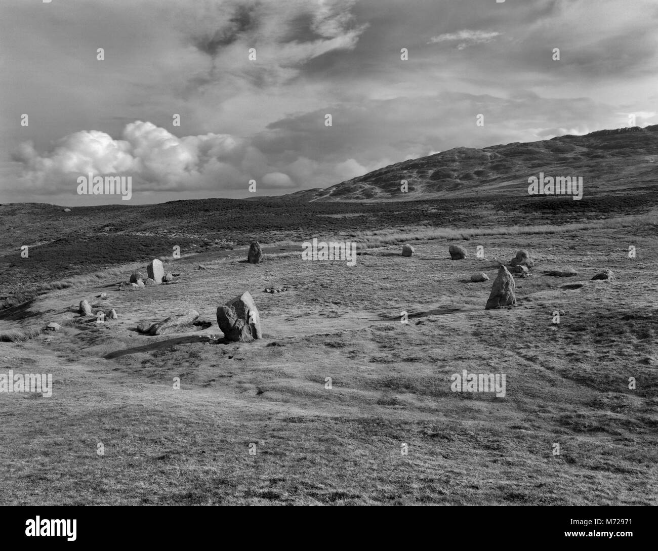 View SE of the Druids' Circle, Penmaenmawr, North Wales: an oval of around 30 granite stones standing in a rubble bank aligned ESE-WNW. Stock Photo