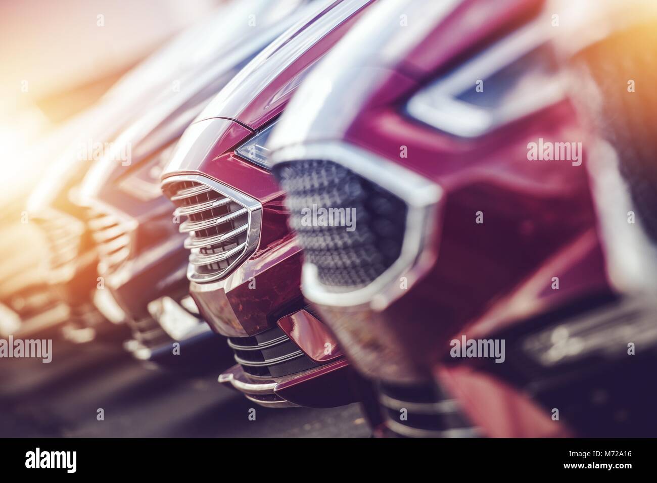 Automotive Industry Car Dealer Stock Closeup Photo. Modern Brand New Vehicles For Sale. Stock Photo