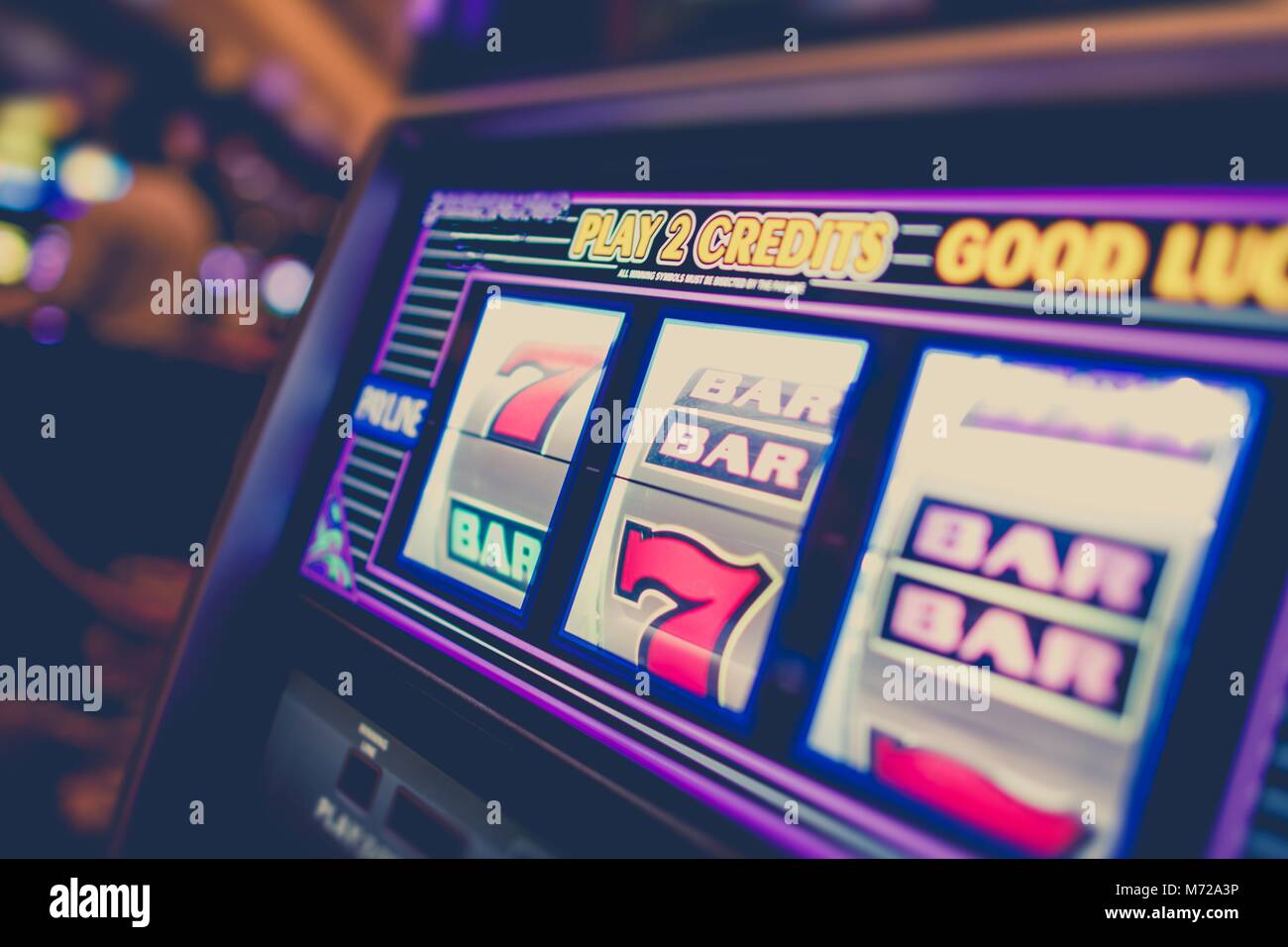 Casino Slot Machine Closeup Photo. Classic Las Vegas Style One Handed Bandit Slot Game. Stock Photo