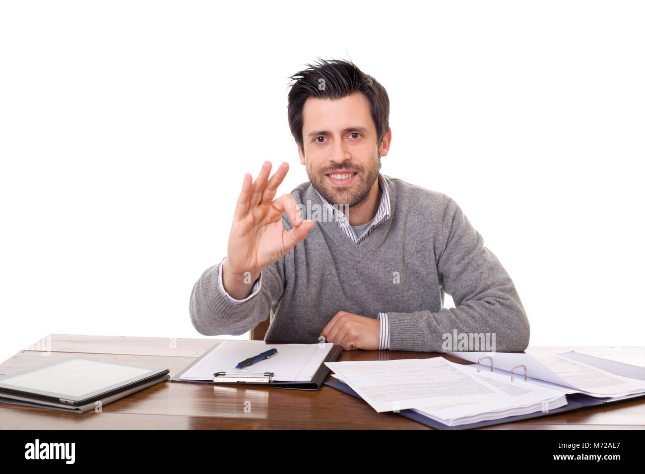 happy casual man on a desk, isolated on white background Stock Photo ...