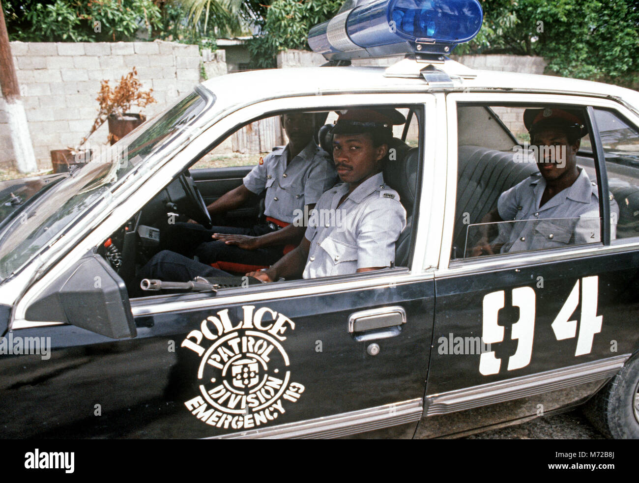 Armed Kingston police with patrol car, Jamaica Stock Photo Alamy