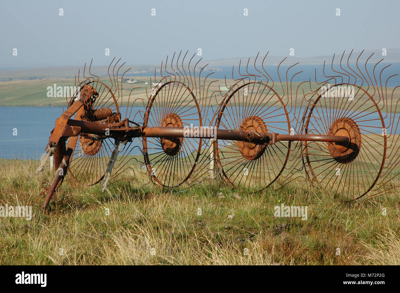 An old wheel rake on Shtland Stock Photo