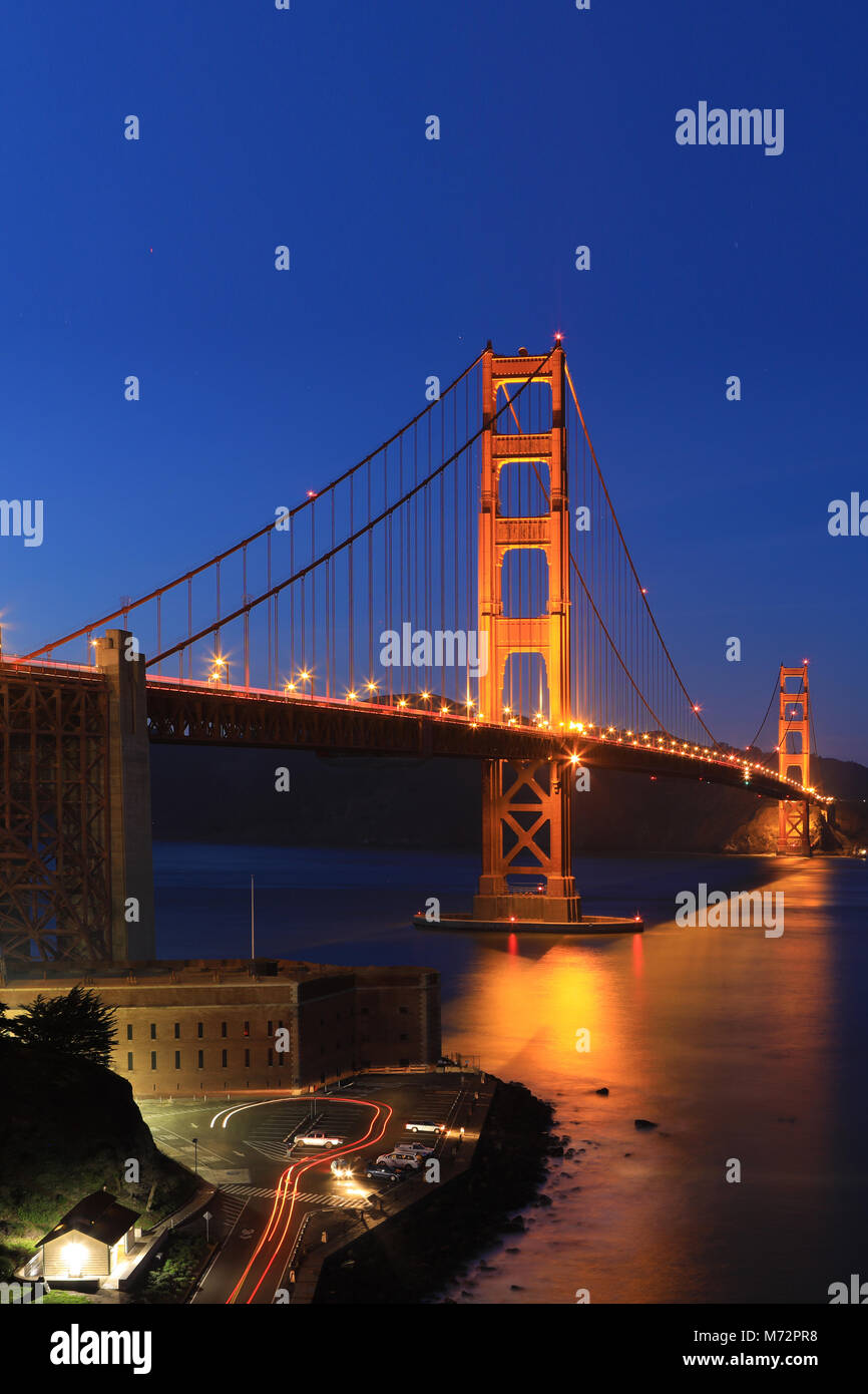 A Vertical of the Golden Gate Bridge at night Stock Photo - Alamy
