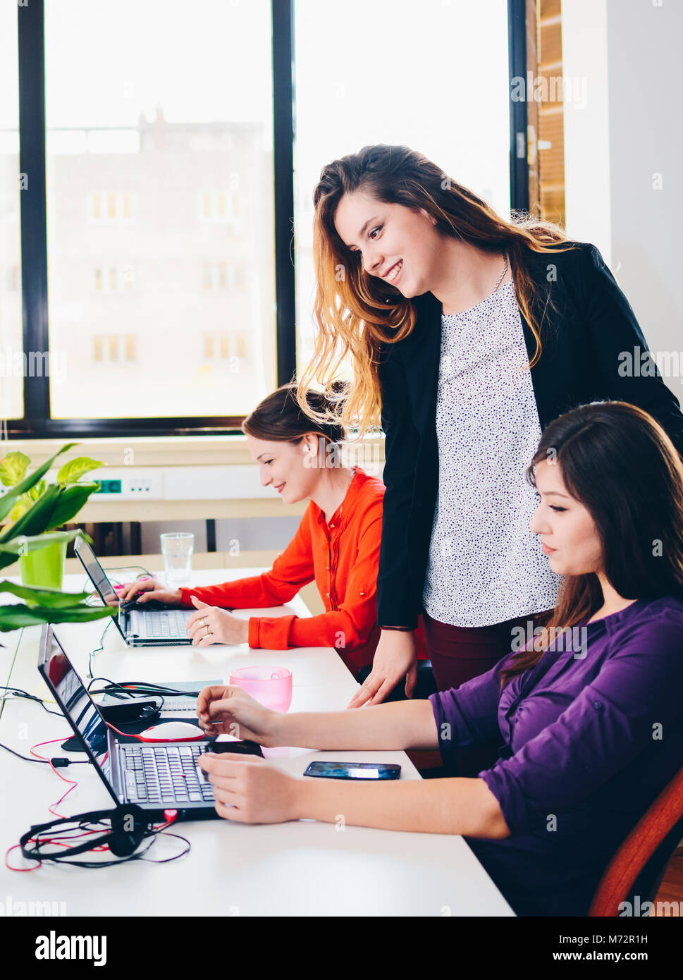 Successful Pretty Young Businesswomans at the Office Stock Photo