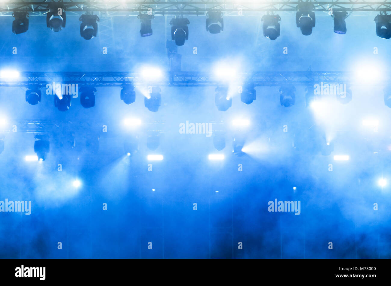 Stage lights during a rock concert. Entertainment industry Stock Photo