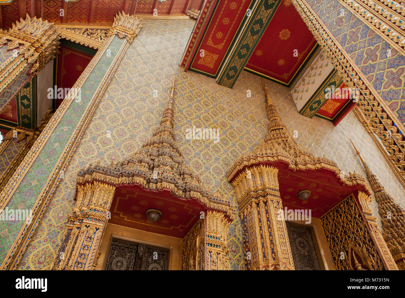 Architectural details of the main temple inside the Grand Palace in Bangkok view from below Stock Photo