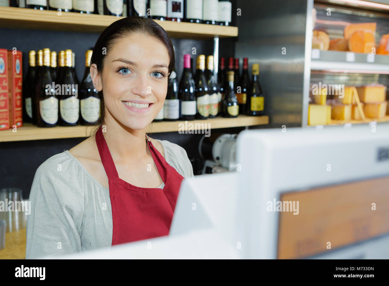 vendor in the cash register Stock Photo Alamy