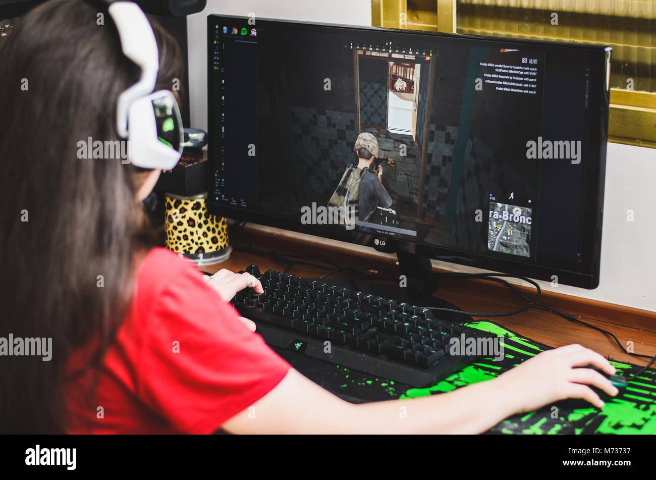 Happy Pretty Blonde Gamer Girl Playing Online Video Game on Her Personal  Computer Stock Photo - Alamy