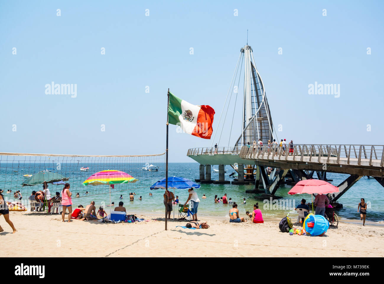 Puerto Vallarta, Jalisco, Mexico, Mexican people sunbathing on a beach. Editorial only. Stock Photo