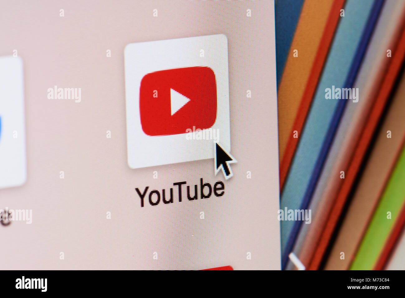 New york, USA - March 8, 2018: Opening youtube web page on laptop screen close-up. Cursor on computer icon Stock Photo